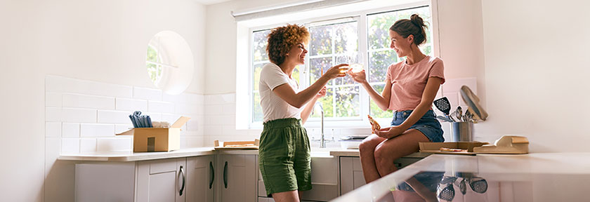 mobile photo of two women in kitchen with moving boxes, June 2024 blog, TCU,