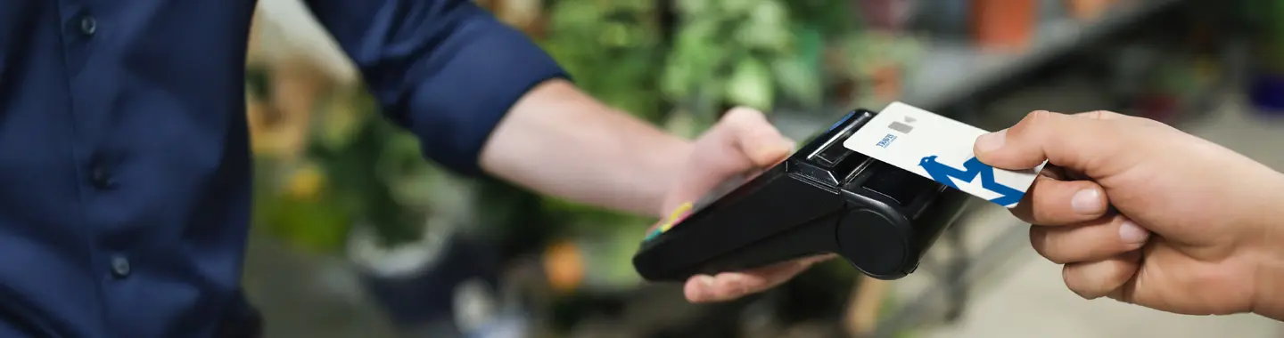 Visa debit card, banner photo, Travis CU,